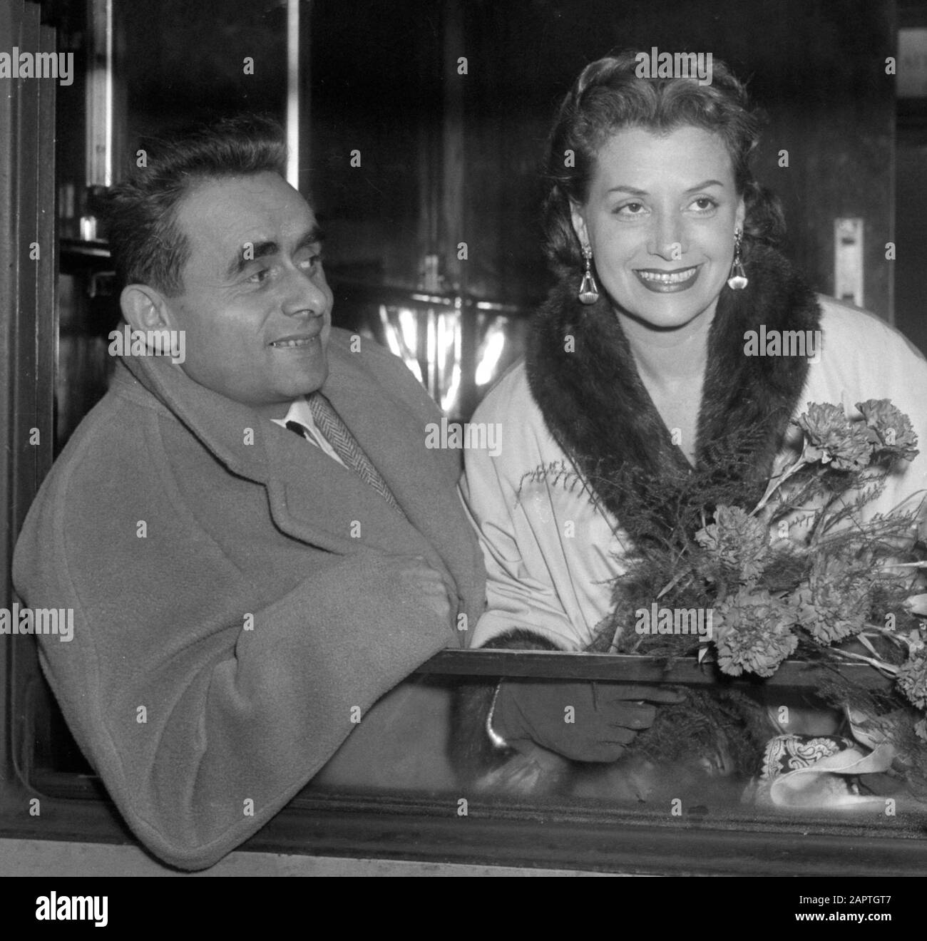 Arrival at the Central Station of Henri George Clouzot with his wife Vera; Stock Photo