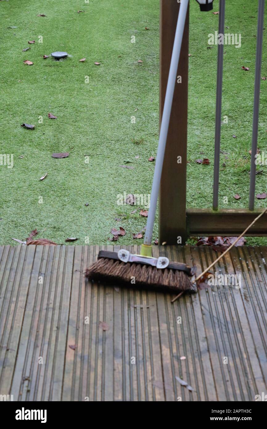 Wash and brush up decking area, soapy water in a bucket and brush for