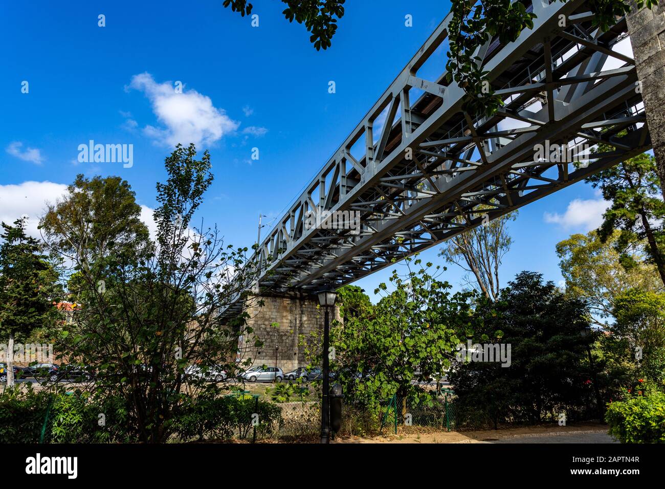 View from underneath of the 127m long metallic railway bridge, opened in 1889, in Oeiras, Portugal Stock Photo