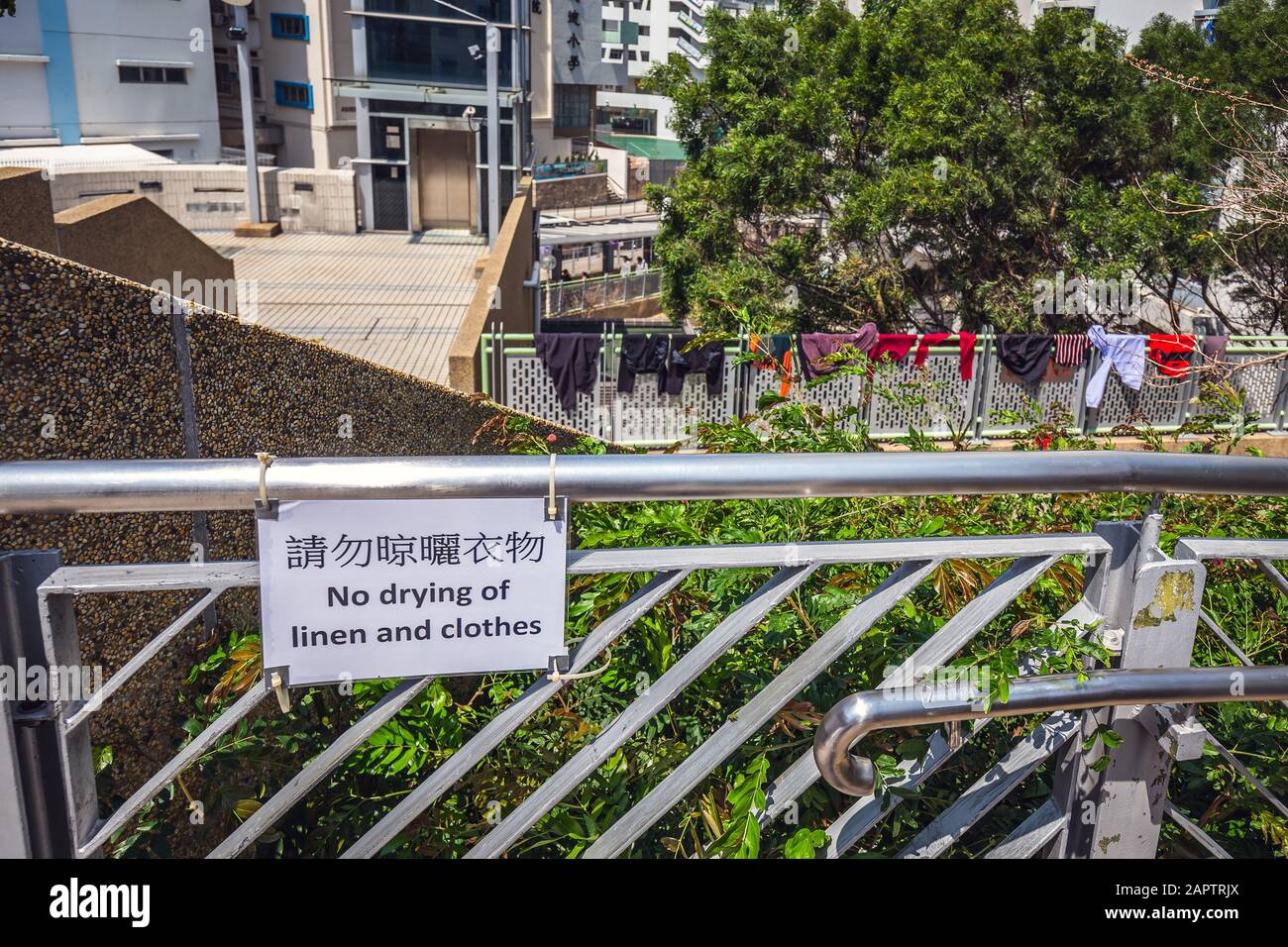 Hong kong apartment building clothes hires stock photography and