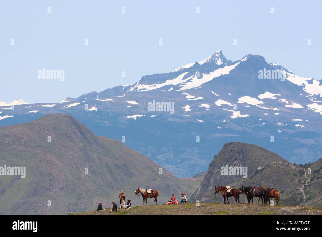 Torres del Paine National Park, Región de Magallanes y de la Antártica Chilena, Chile - December 4, 2018: Hikers and local trackers resting and enjoin Stock Photo