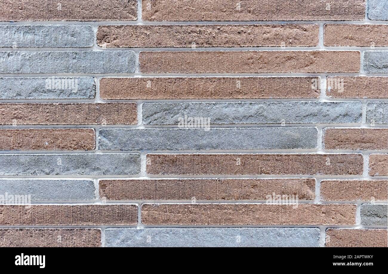 Decorative finishing stone. Texture of a rough stone wall. Background