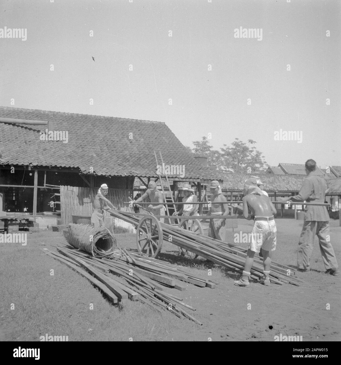 War volunteers in Malacca and Indonesia  Japanese prisoners of war at work Date: 1946 Location: Indonesia, Java, Dutch East Indies Keywords: POWs Stock Photo