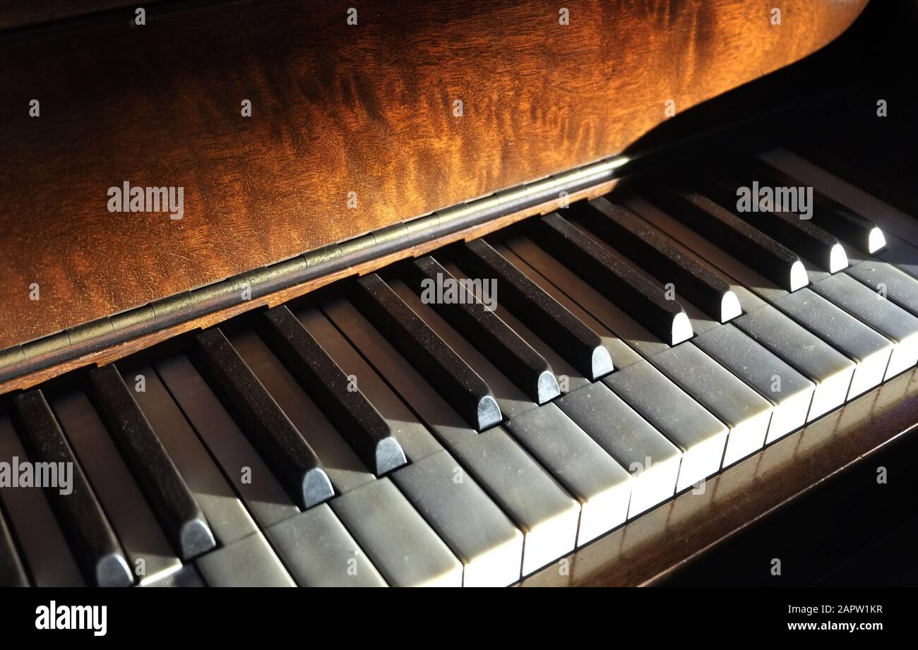 The keyboard of an upright piano Stock Photo Alamy