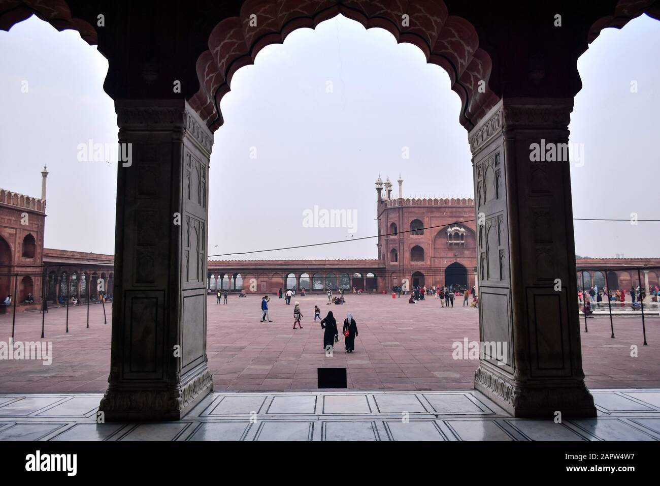 Visitors At The Jama Masjid Or Grand Mosque In Delhi.Jamia Masjid Or ...