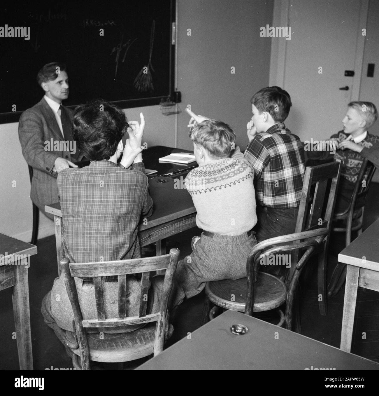 Training of the Royal Danish Ballet  Children receive education at the Royal Danish Ballet School Date: March 1954 Location: Denmark, Copenhagen Keywords: ballet, dancers, children, teachers, lessons, school classes Stock Photo
