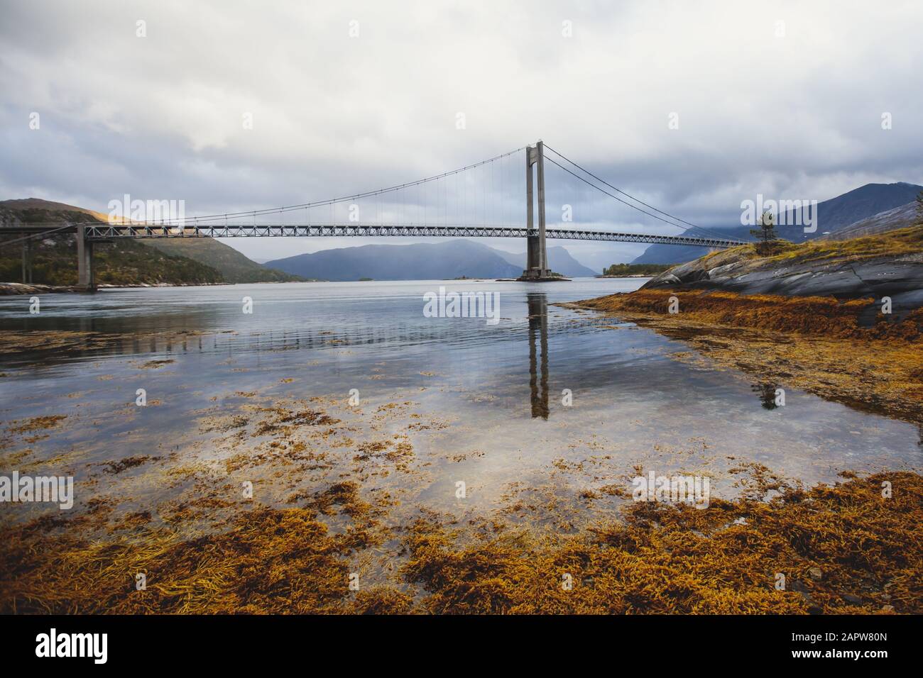 Classic Norwegian cold panoramic landscape of Efjorden fjord, Ballangen municipality, Nordland county, Ofoten district, Norway with Efjord Bridges, St Stock Photo