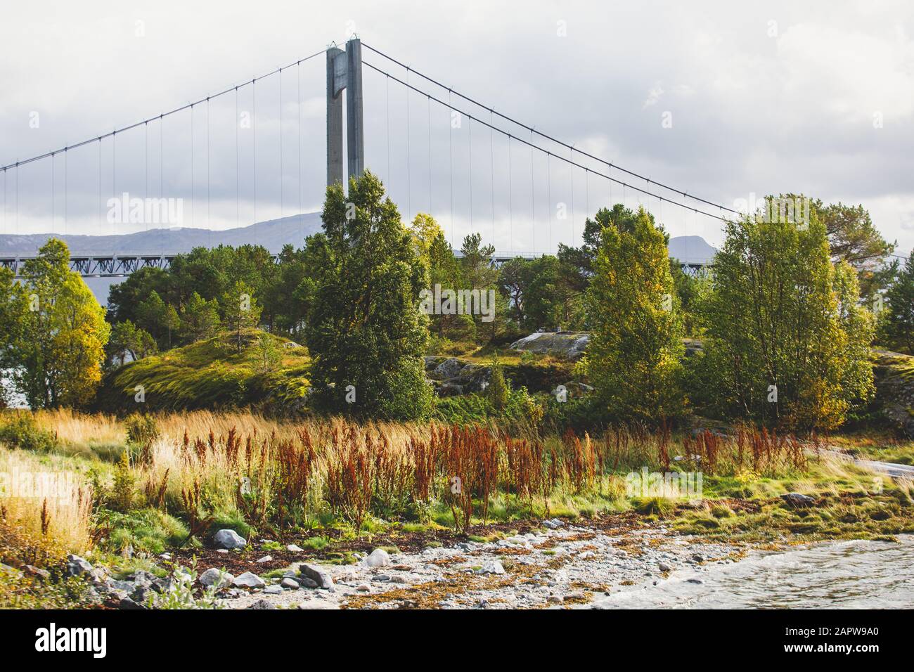 Classic Norwegian cold panoramic landscape of Efjorden fjord, Ballangen municipality, Nordland county, Ofoten district, Norway with Efjord Bridges, St Stock Photo