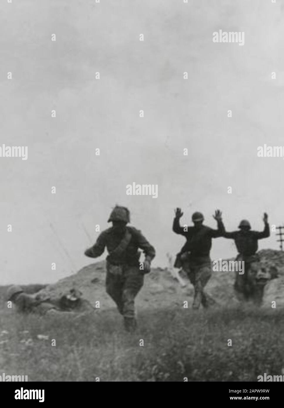 Spaarnestad Photo/SFA022804149 World War II. Prisoners of war are carried away with hands up. Eastern Front, 1941. POWs (Prisoners of war) are being marched off, with hands hero high. Eastern front, 1941.; Stock Photo