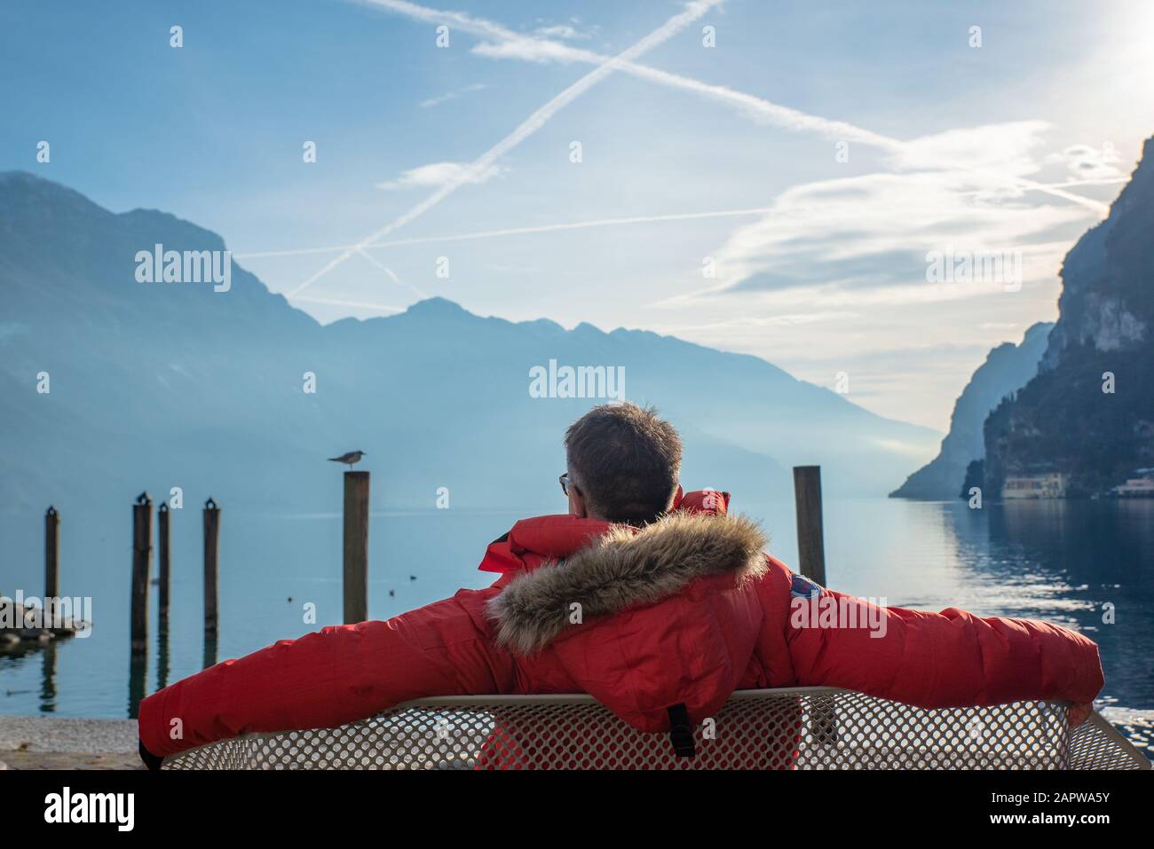 Bench man lake garda italy hi-res stock photography and images - Alamy
