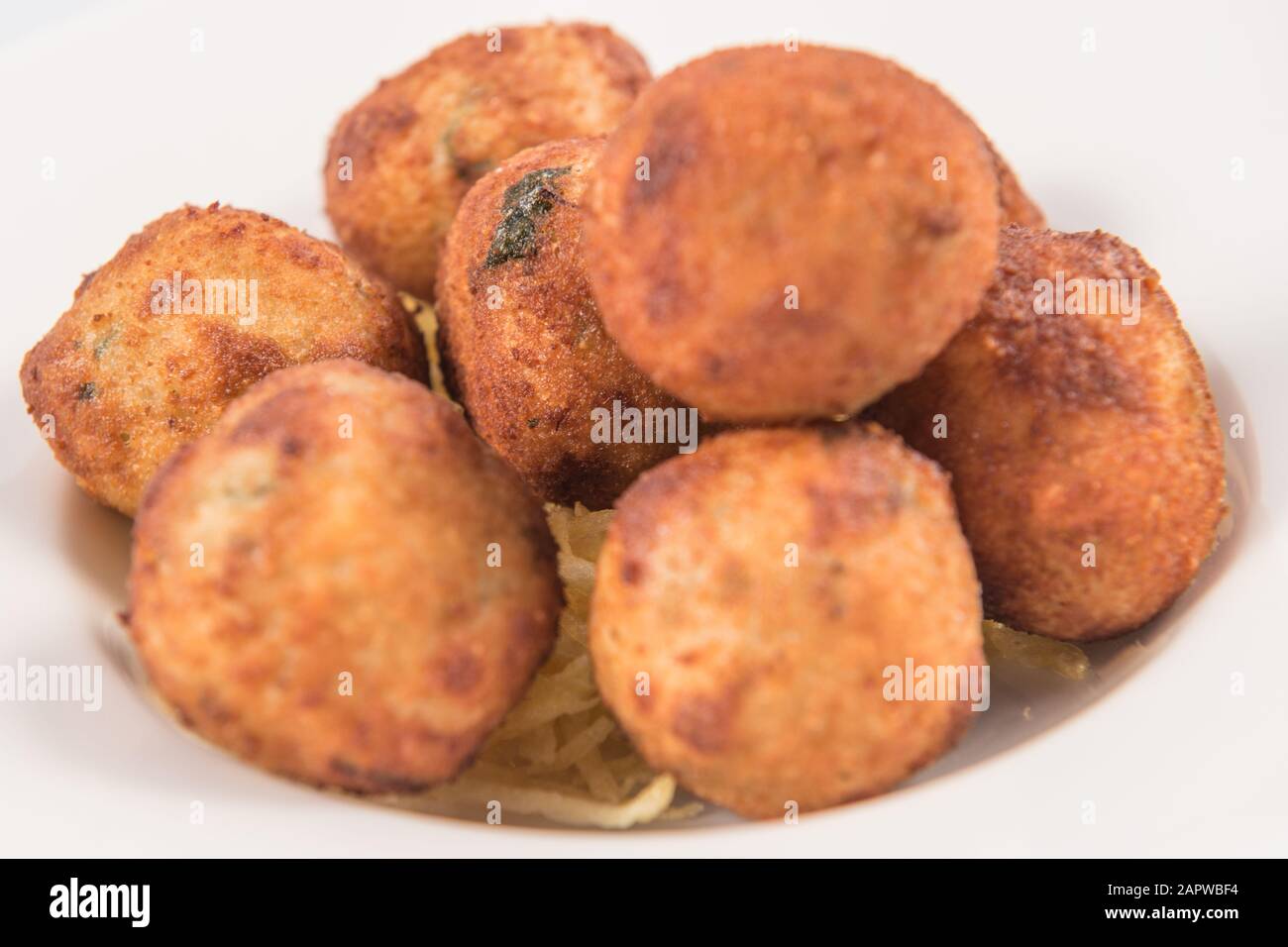 Salt Cod Croquettes balls with straw potatoes Stock Photo Alamy