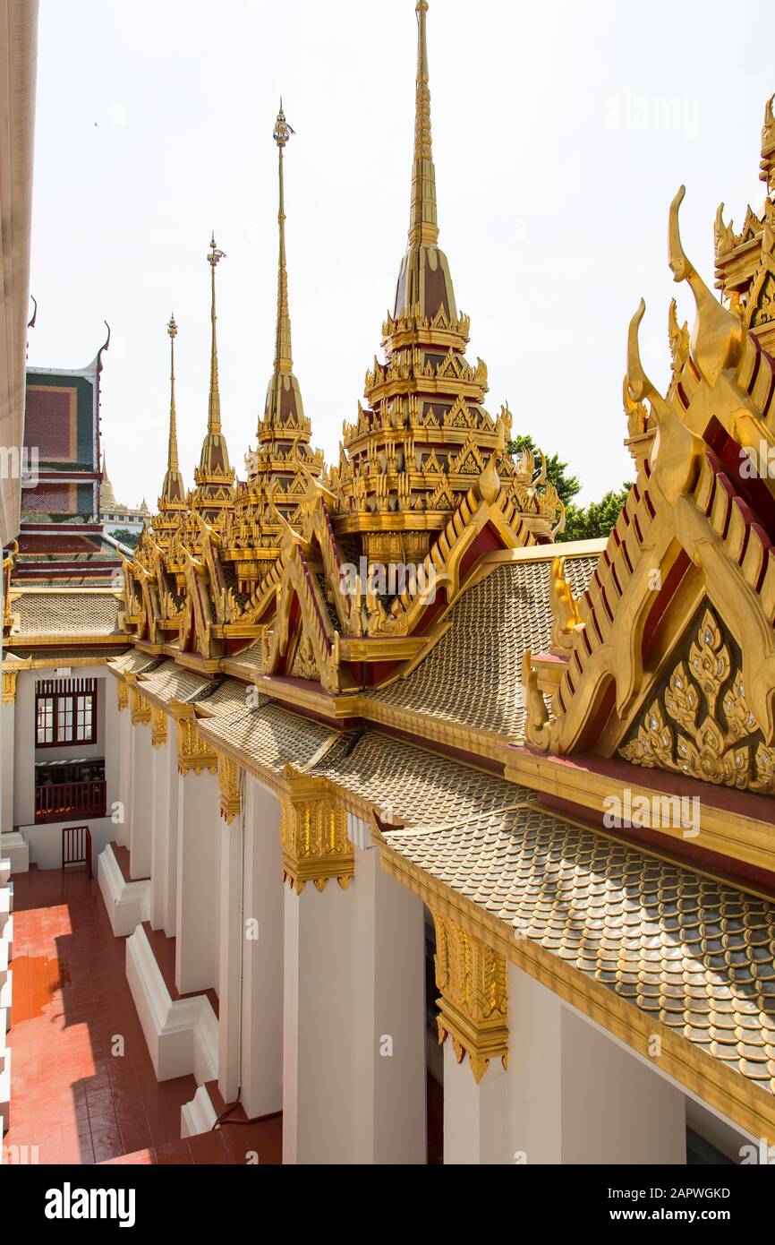 Wat Ratchanatdaram's (Loha Prasat) golden towers and architecture Stock Photo