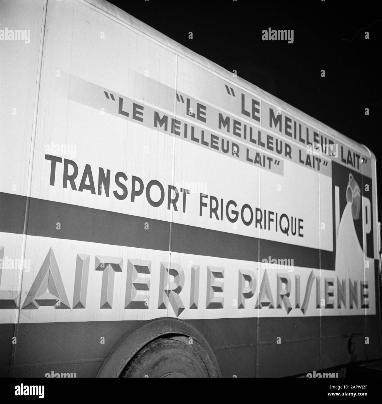 Reportage Paris  Milk factory: the milk is transported in the refrigerated truck of Laiterie Parisienne Date: 1950 Location: France, Paris Keywords: milk, dairy factories, advertising, transport, trucks Stock Photo