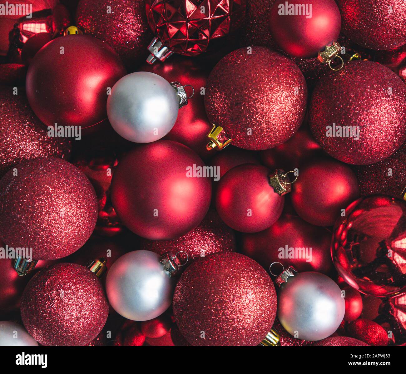 Close up of a variety of red and white christmas ball ornaments. Stock Photo