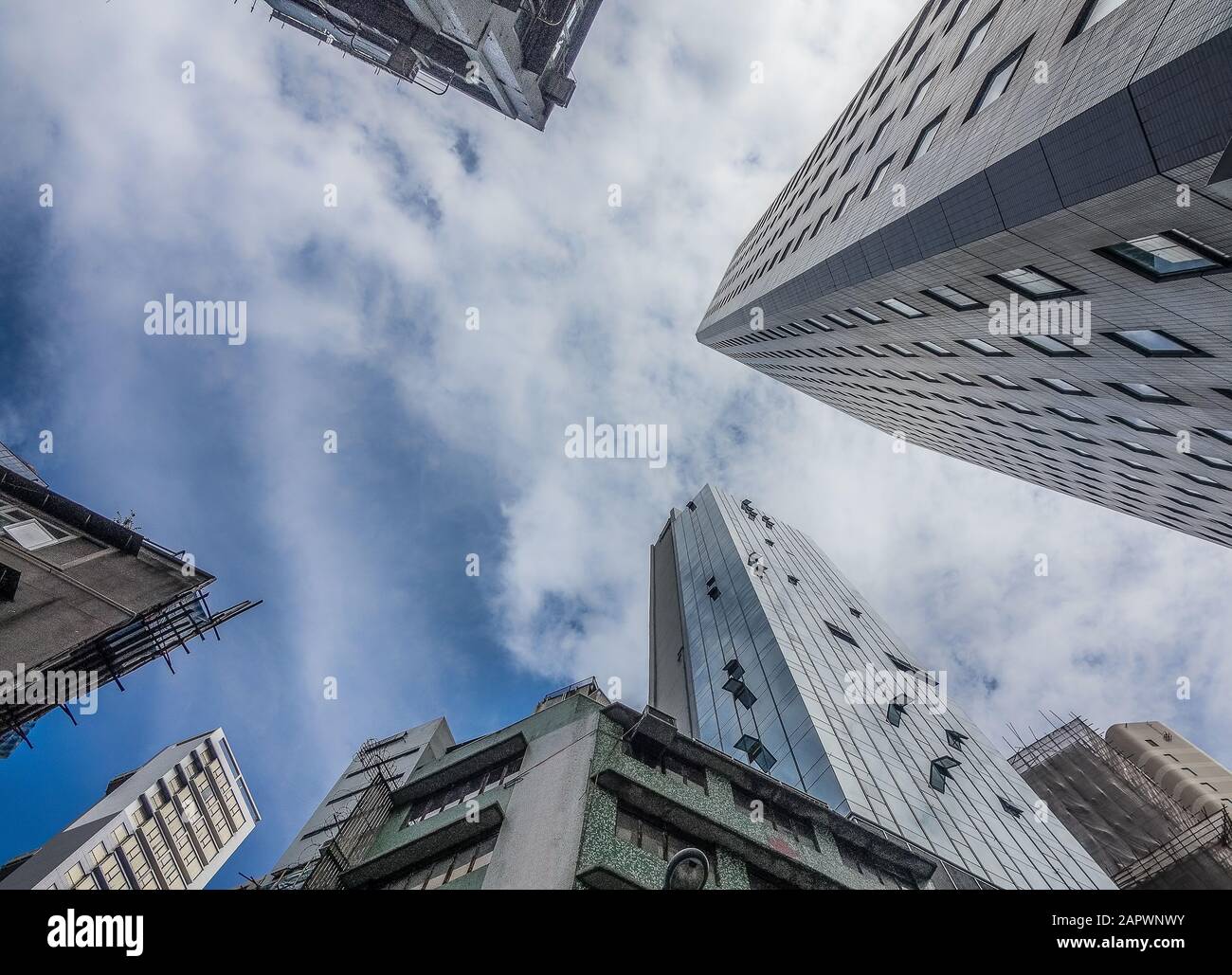 Low angle shot of high residential buildings under the cloudy sky Stock ...