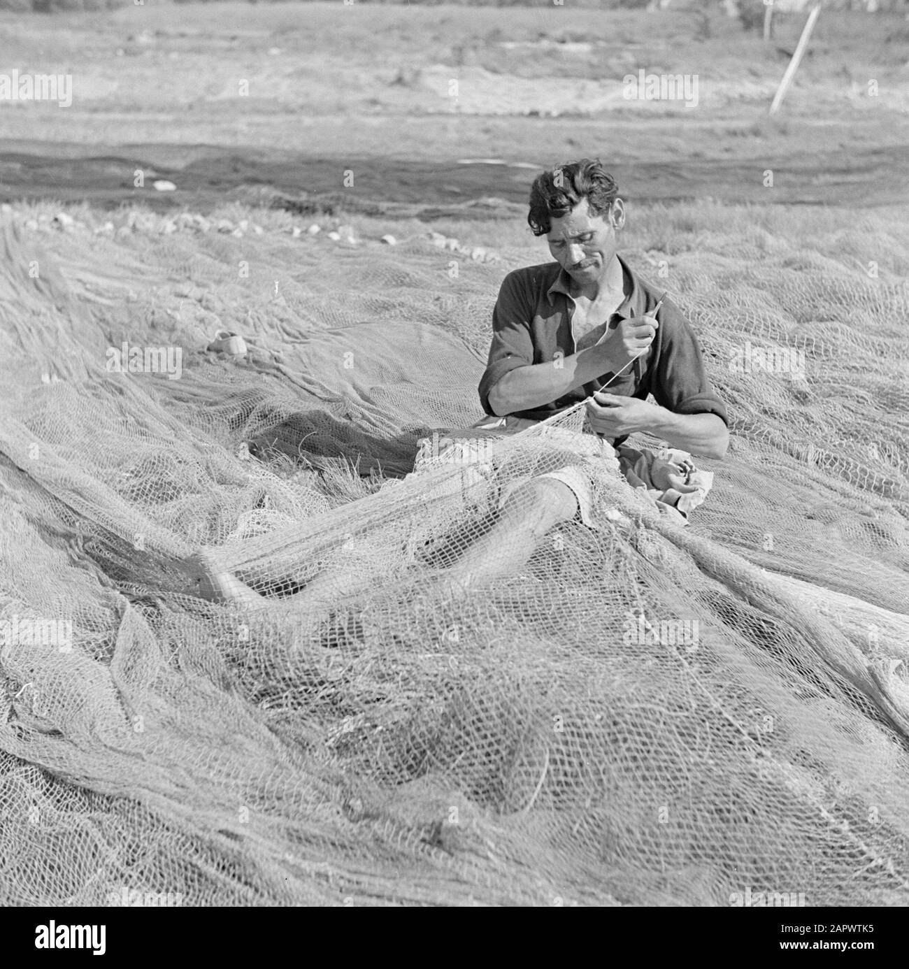 Retraining Fish Fishing boats in bay oil hi-res stock photography and images - Alamy