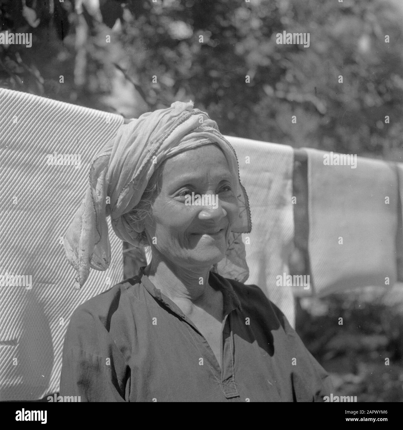 War Volunteers In Malacca And Indonesia Old Woman On A Rubber Plantation In Malacca Annotation Published In Guys Of The Deed With The Caption Malay Woman On Malacca For Drying Rubbermatjes Date