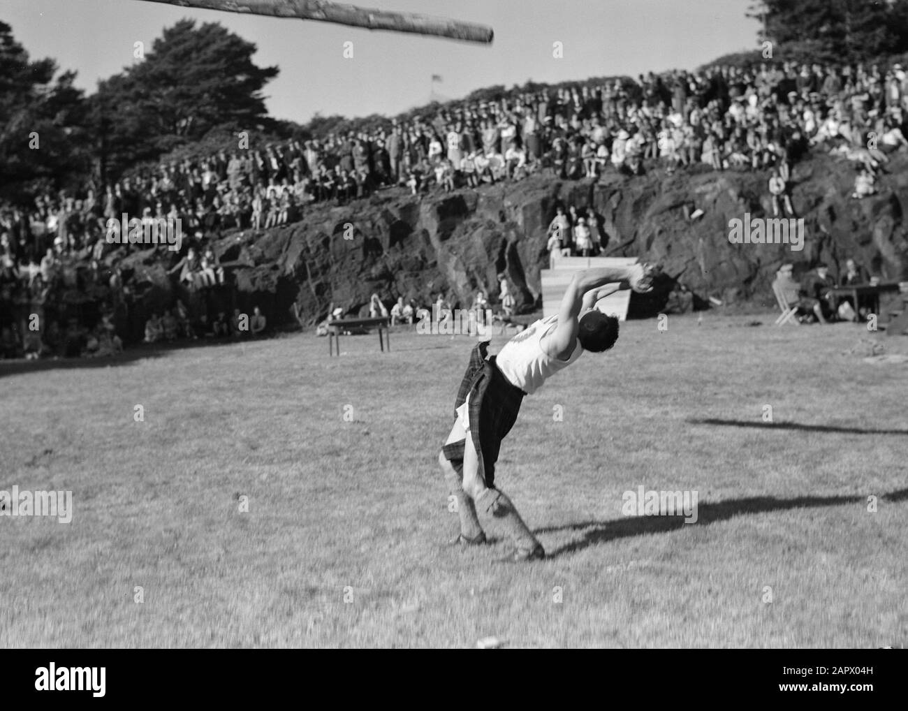 Scotland The Highlands Pole throwing during the Highland Games on