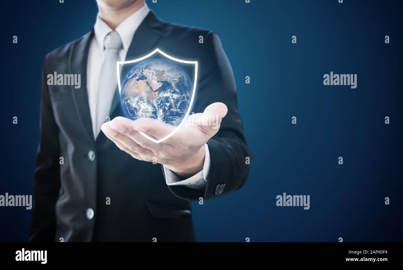 Businessman holding globe with shield icons. Protect the world and environmental conservation. Element of this image are furnished by NASA Stock Photo