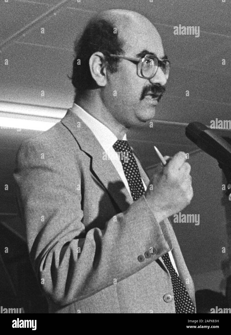 Congress Council for the Liberation of Suriname in Rotterdam  mr. Janki (standing), dr. Sedny (l) Date: March 15, 1986 Location: Rotterdam, Zuid-Holland Keywords: conferences Stock Photo