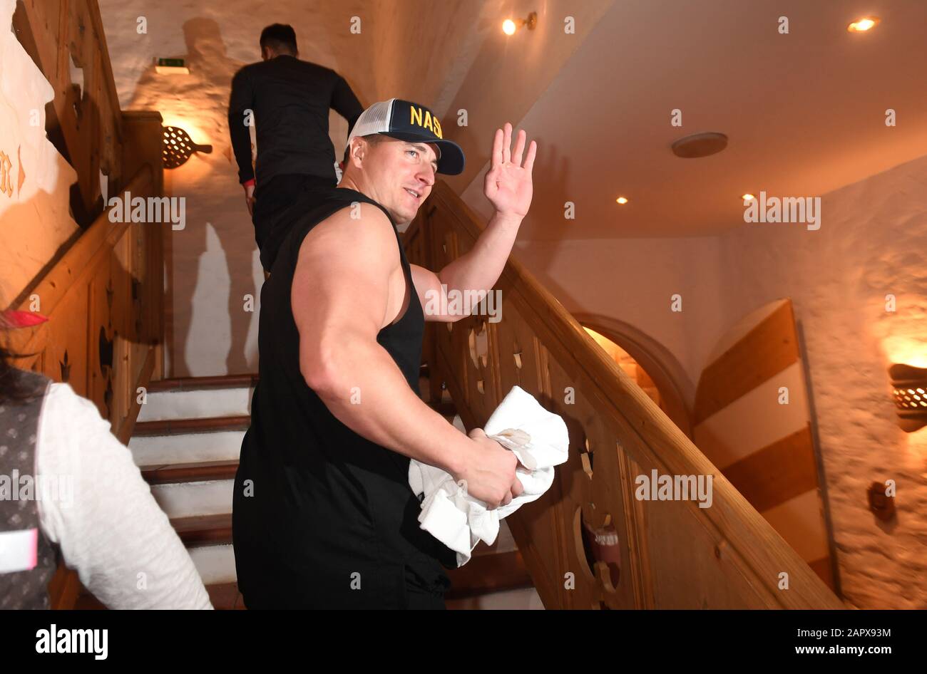 Going Am Wilden Kaiser, Austria. 24th Jan, 2020. The singer Andreas  Gabalier walks up a staircase in sportswear at the Weißwurstparty in the  Stanglwirt, one day before the legendary Hahnenkamm race. The