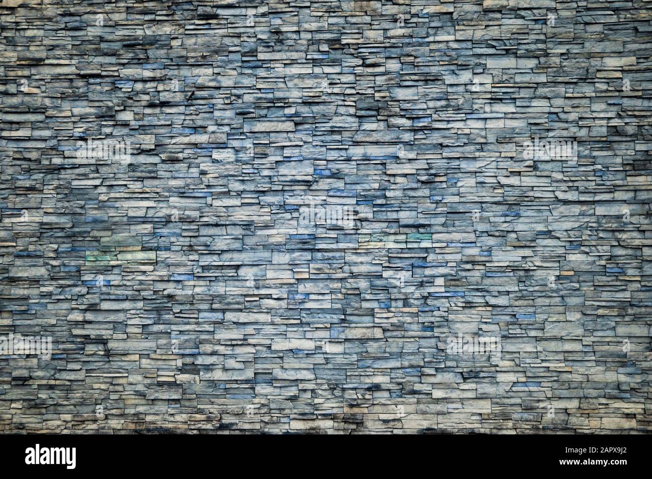 Abstract Irregular Ocean Blue Color Brick Wall Patterns as Background or Textures Stock Photo
