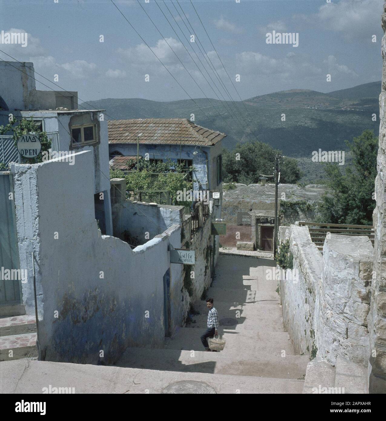 Safad. Artists' colony: street with wide stairs with on the left the workshops of the artists Alweil and Merzer and at the end of the street Amitai Date: undated Location: Israel, Safed Keywords: workshops, hills, artists' colonies, street sculptures, stairs, dwellings Personal name: Alweil, Arieth, Amitai, Itzhak, Merzer, Arieth Stock Photo
