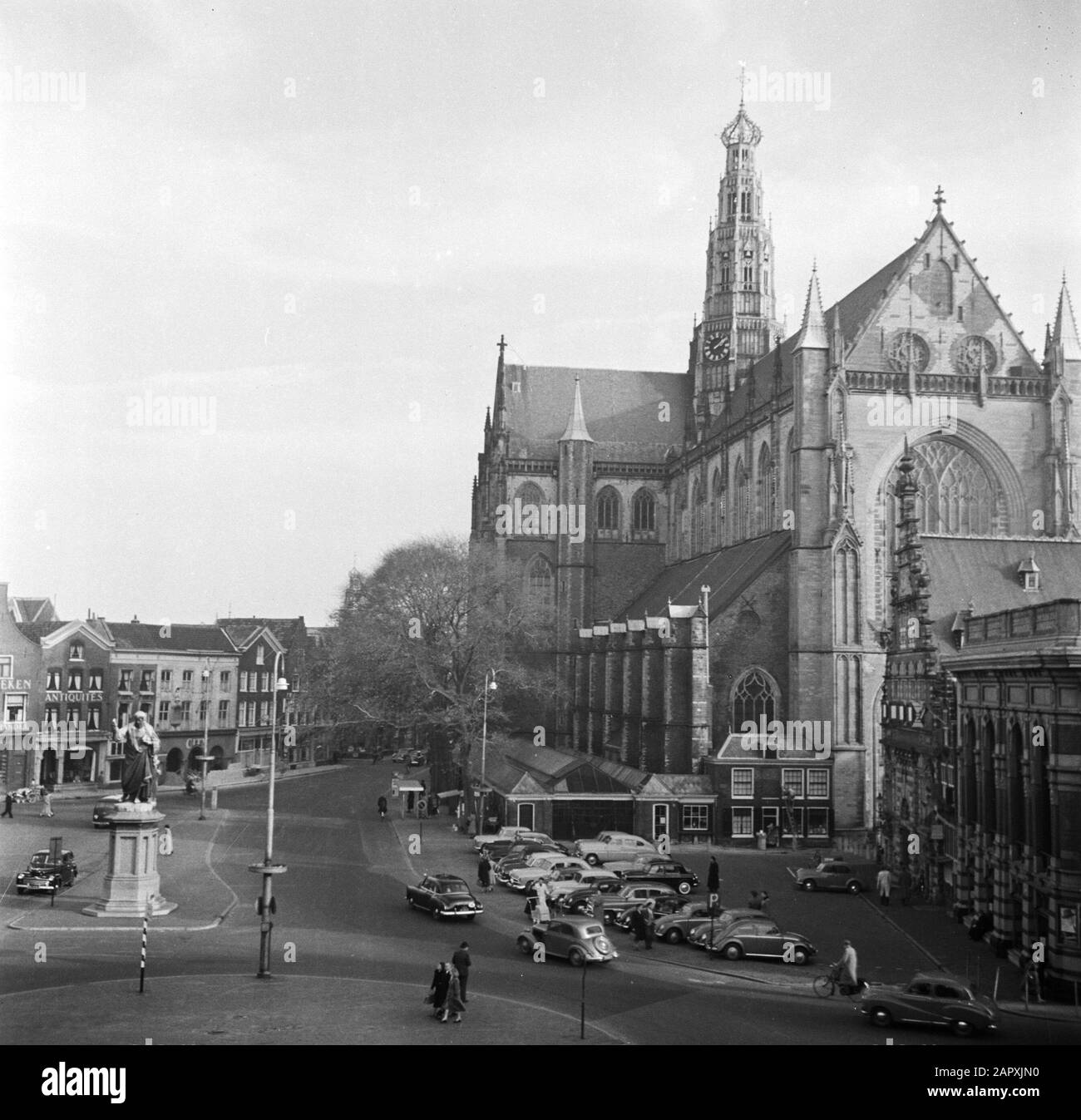 street sculptures, churches, exterior, car, large market Date undated