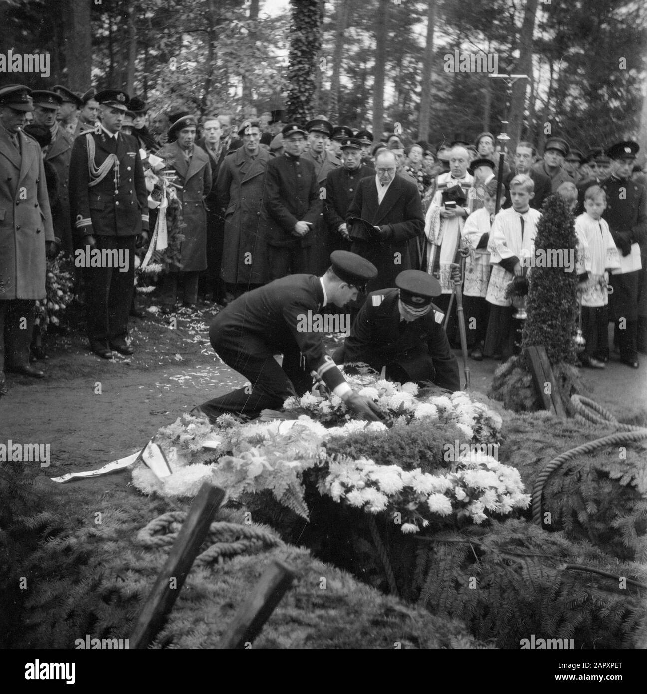 Military funerals Two naval officers arrange a wreath at the quarry at ...