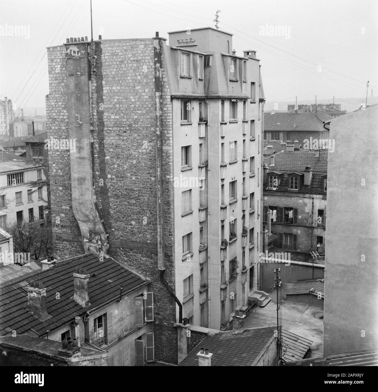 The Daily Work Of A Concierge In A Paris Apartment Building View From The Apartment House Date 1936 Location France Paris Keywords Buildings Street Sculptures Stock Photo Alamy