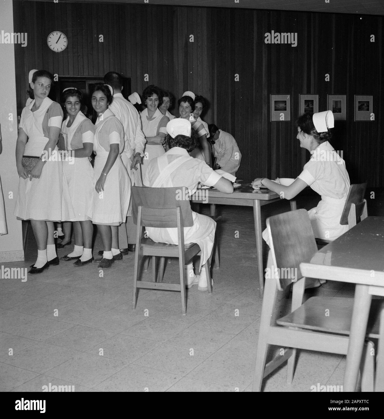 Nursing staff in the canteen of the Beilinson Hospital at Petah Tikwa Date: January 1, 1960 Location: Israel, Petach Tikwah Keywords: restaurants, chairs, uniforms, nurses, hospitals Personal name: Beilinson, Moshe Stock Photo