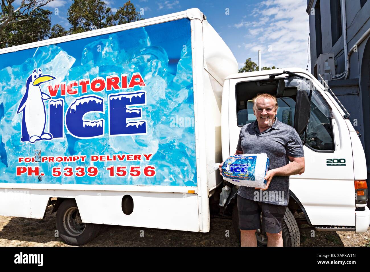 Lexton Australia /  Owner and operator of Victoria Ice delivers ice to a Pub in Lexton Victoria Australia. Stock Photo