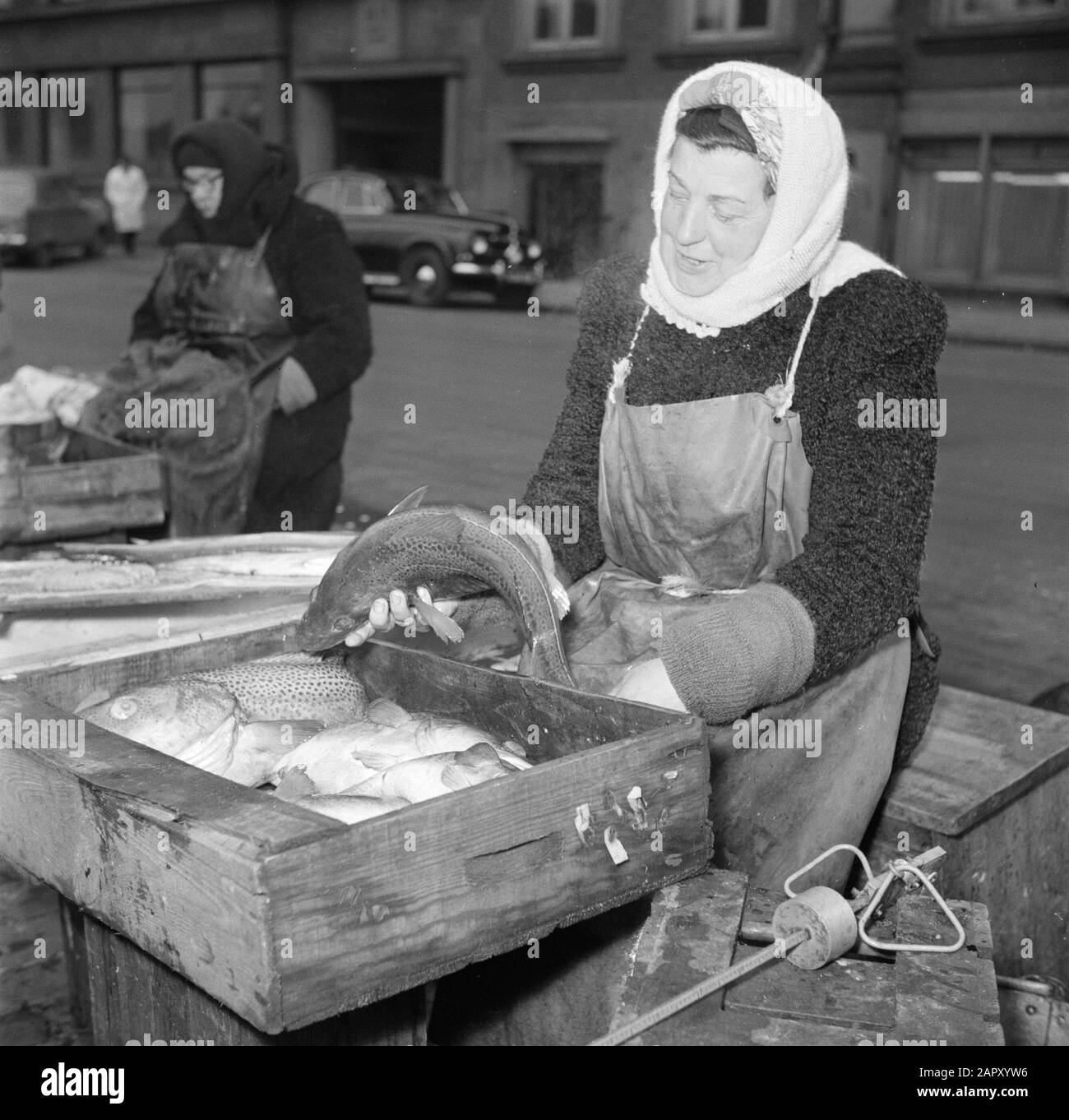 Market in Copenhagen Women at their merchandise at the fish market in