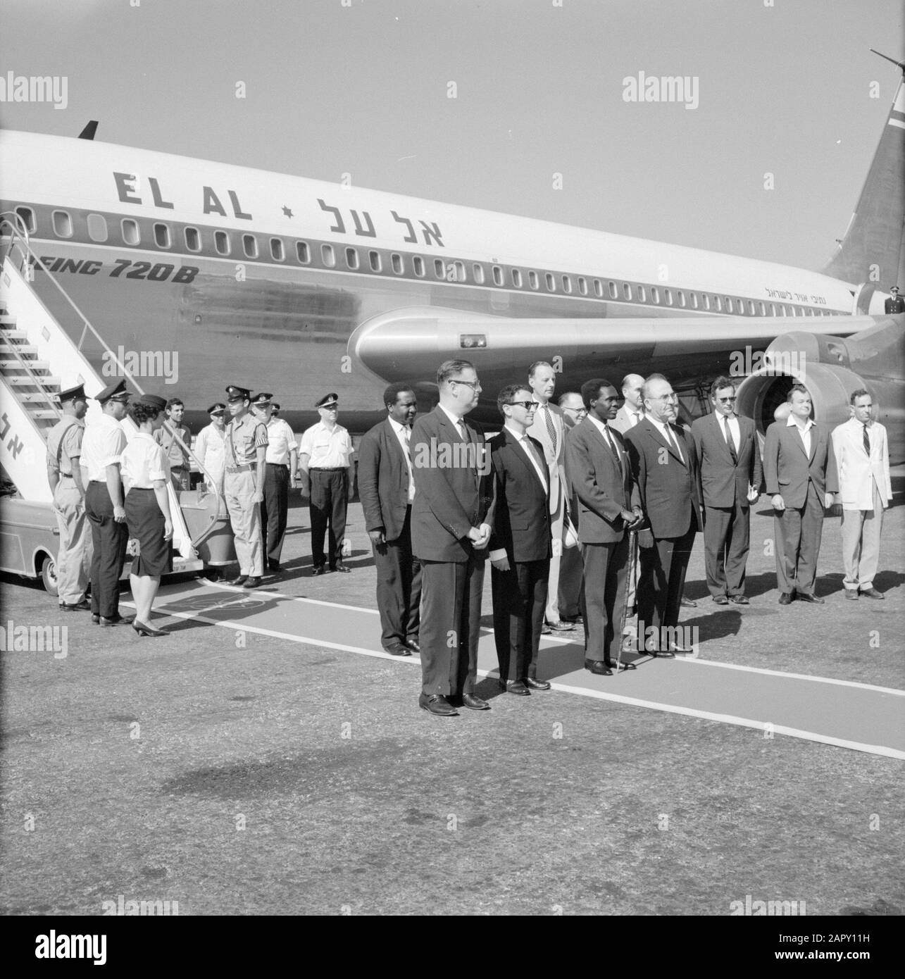 Israel: Lydda Airport (Lod) Welcome ceremony on arrival of Ugandan Prime  Minister Milton Obote (3rd from left); front left Deputy Prime Minister Aba  Eban, front right Prime Minister Levi Eshkol Date: undated