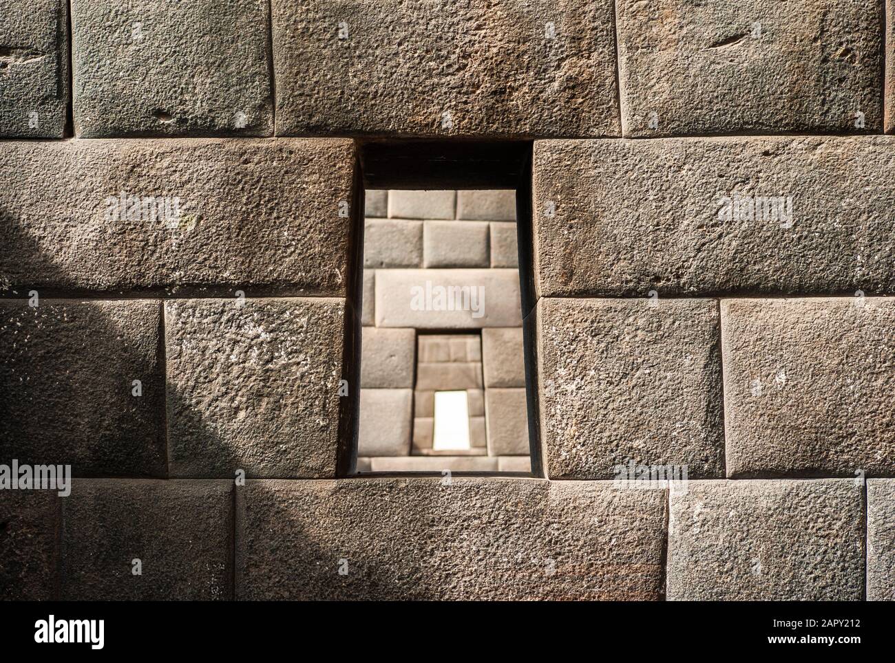 Three aligned trapezoidal windows in an Inca wall, Temple of the Rainbow, Coricancha or Qorikancha Ruins, Santo Domingo Convent, Cuzco, Peru Stock Photo
