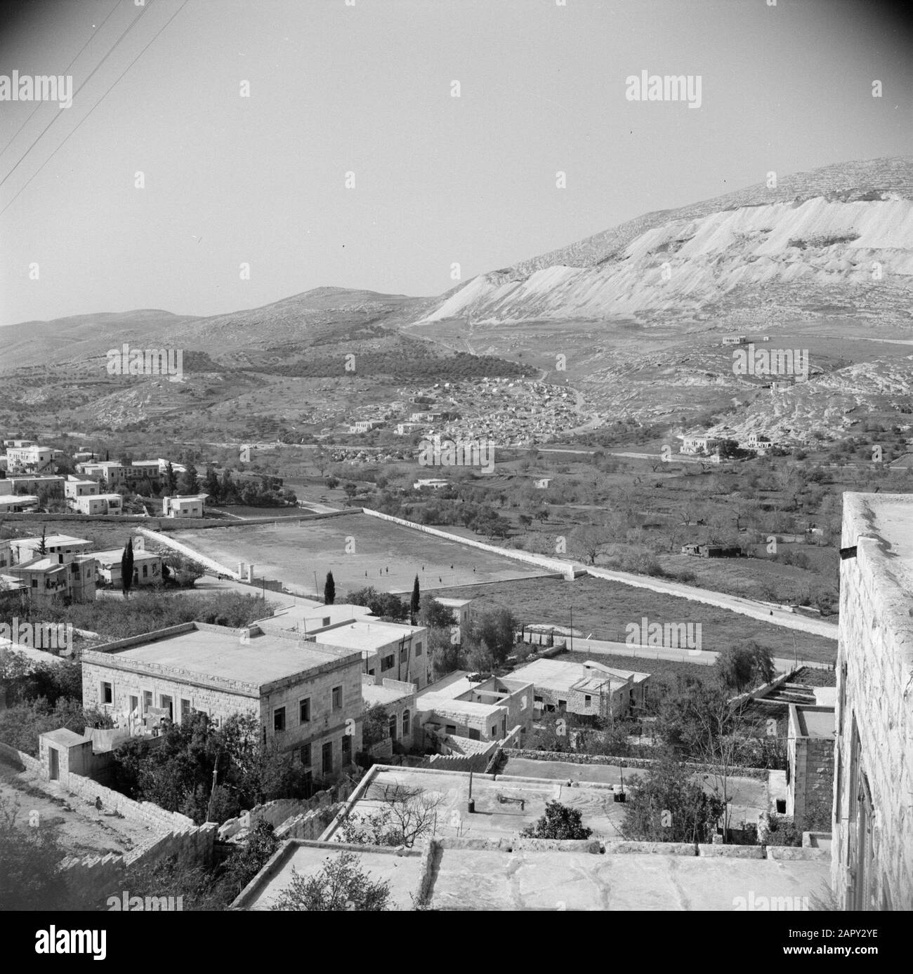 Middle East 1950-1955: Jordan View of Nablus with a football field  Annotation: At the time of the recording this place was in Jordan Date:  1950 Location: Palestine, Jordan, Nablus Keywords: mountains ,