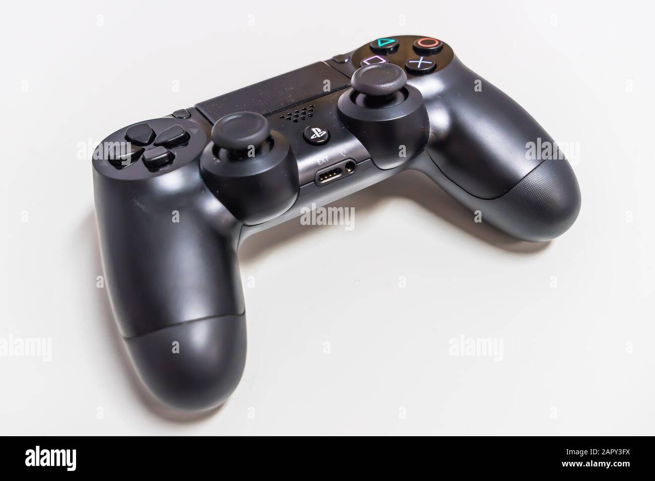 Sony Play Station 4 Pro Gaming Console On The Table With Two Joysticks And  Some Games On Dvd For Ps4 Stock Photo - Download Image Now - iStock