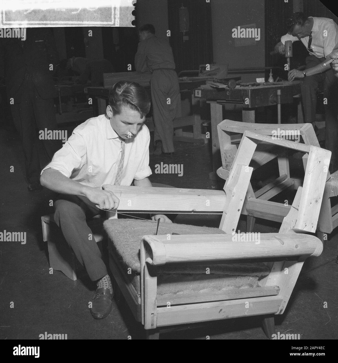 Boy makes chair hires stock photography and images Alamy
