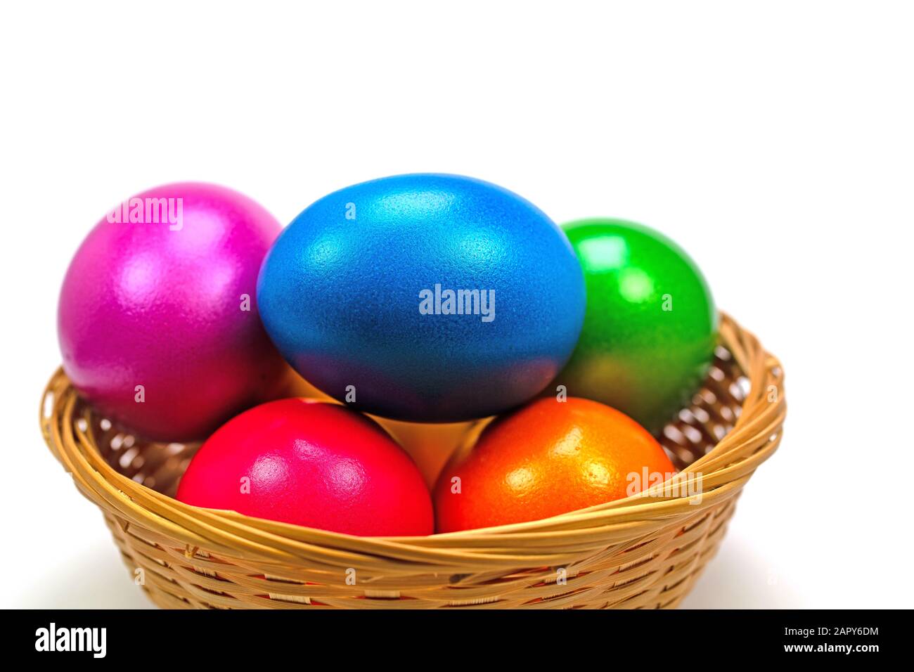 Colorful easter eggs in the basket Stock Photo