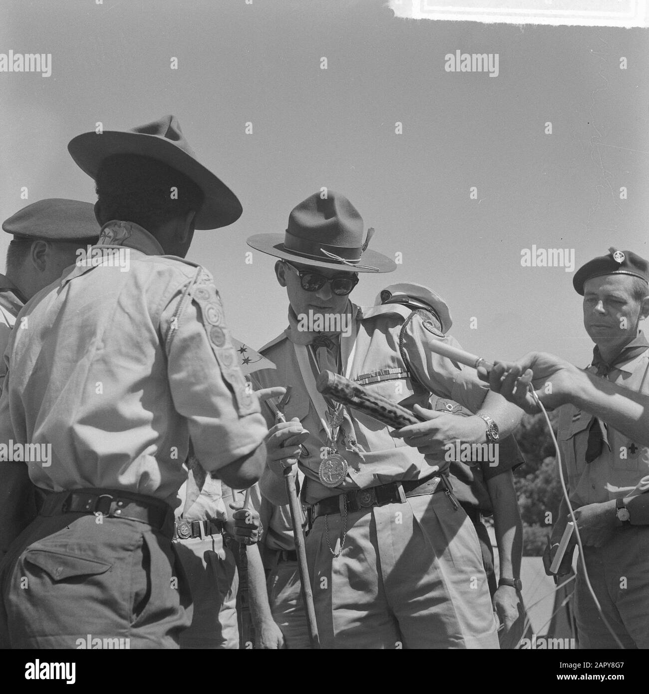 Jamboree 1963 at Marathon Greece. The only Surinamer in the camp gave the prince an article of his country Date: 12 August 1963 Location: Greece Keywords: COUNTRIES, camps, princes Institution name: Jamboree Stock Photo