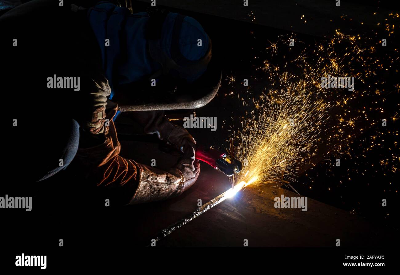 Welder Industrial automotive part in factory Stock Photo Alamy