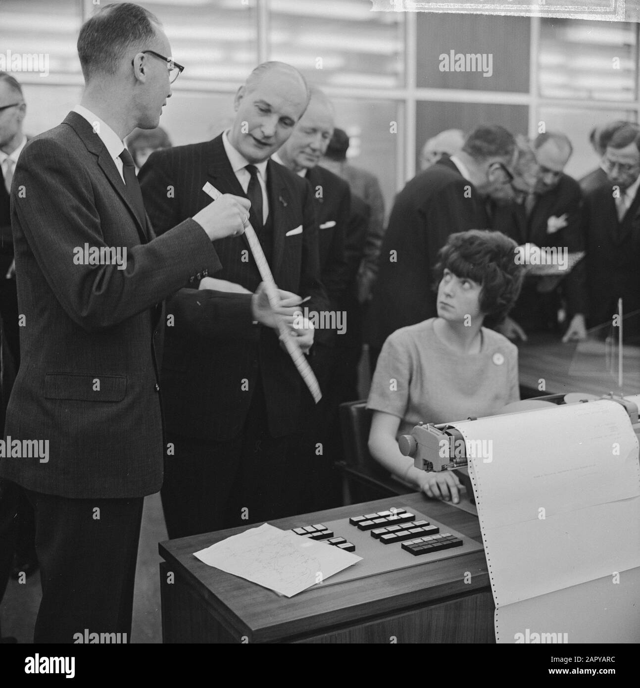 Calculator in use at Technical University of Applied Sciences in Delft by His Excellency mr. Th. Bot of Education Arts and Sciences by pressing the button Date: January 16, 1964 Location: Delft, Zuid-Holland Stock Photo