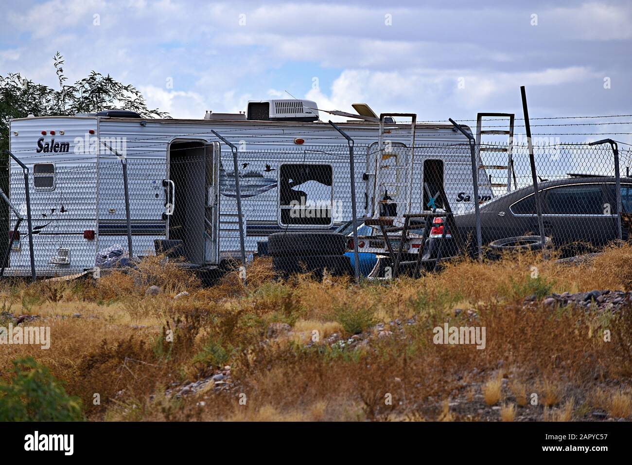 PHOENIX, AZ, UNITED STATES May 22, 2019 A junkyard with old cars and