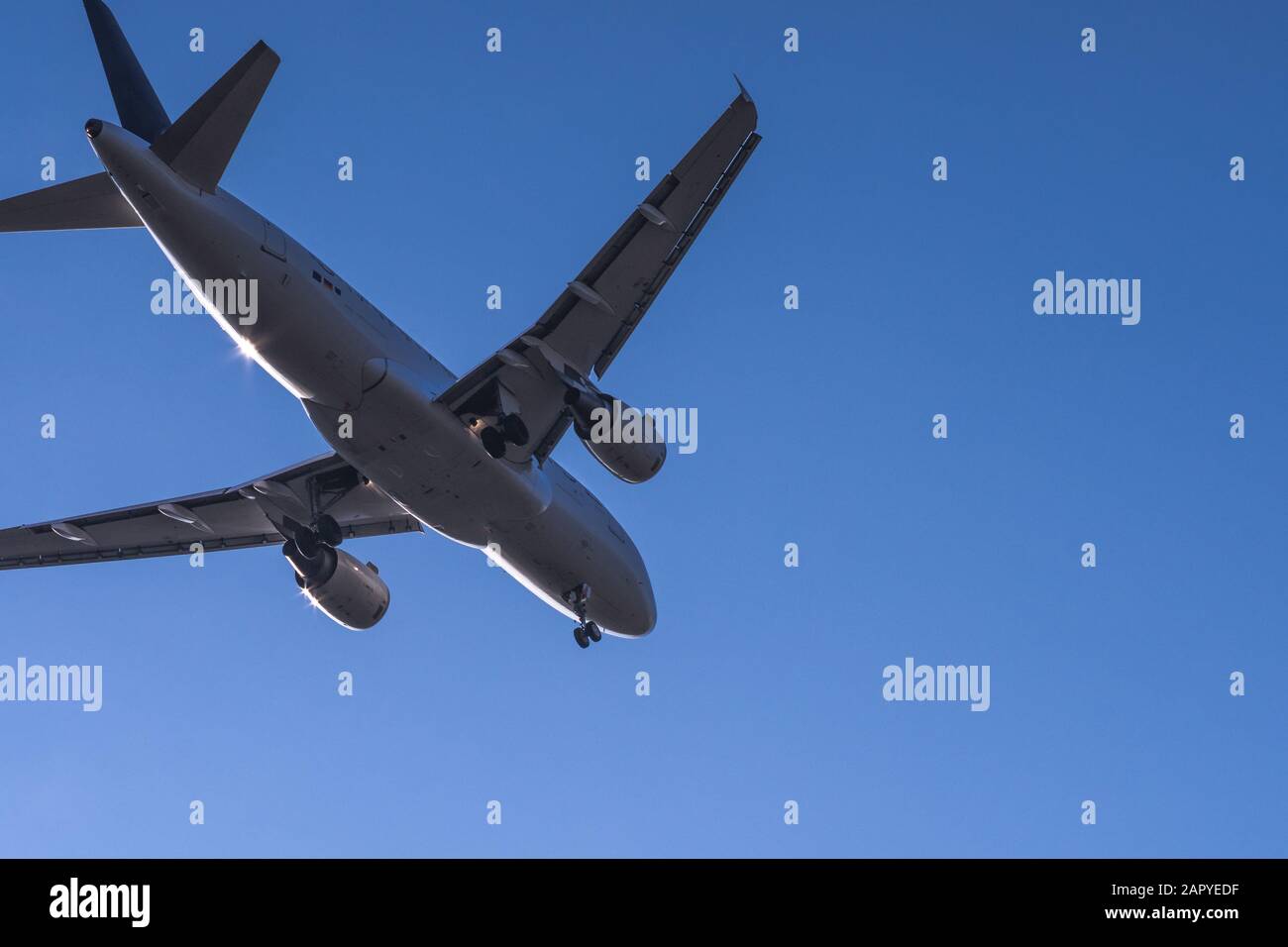 Close view to landing passenger jet Stock Photo