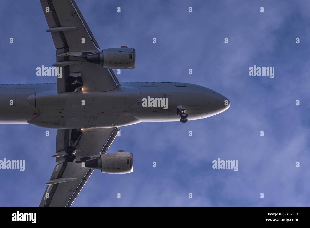 Close view to landing passenger jet Stock Photo