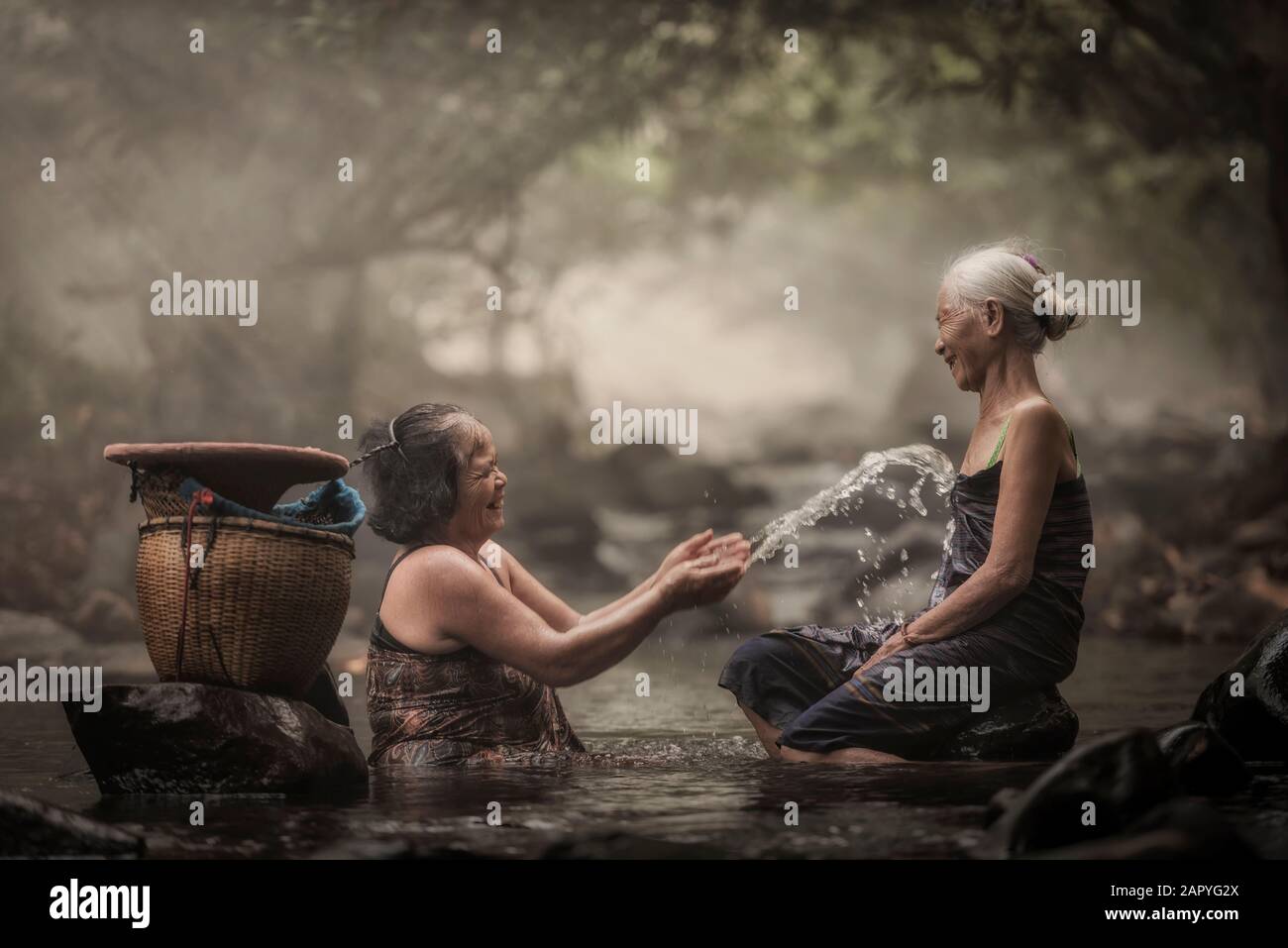 Old asian woman hi-res stock photography and images - Alamy