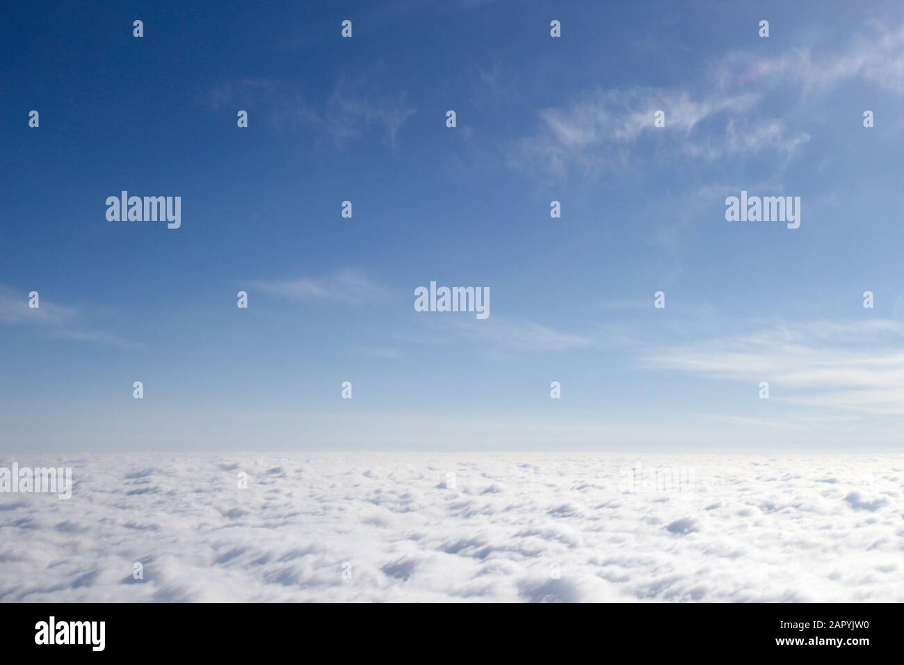 View from a plane on a closed cloud cover, a third of clouds Stock Photo