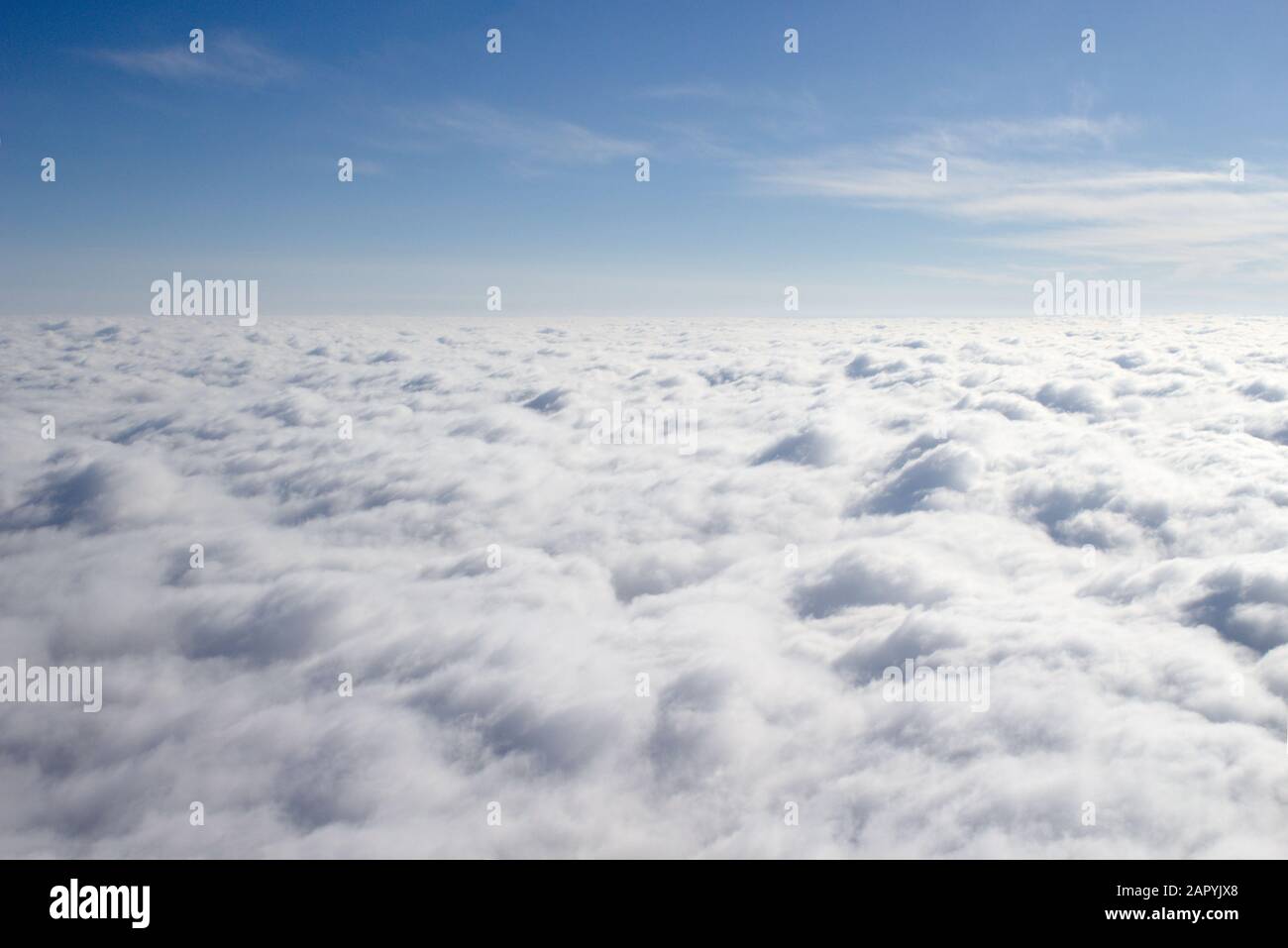 View from a plane on a closed cloud cover, a third of sky Stock Photo