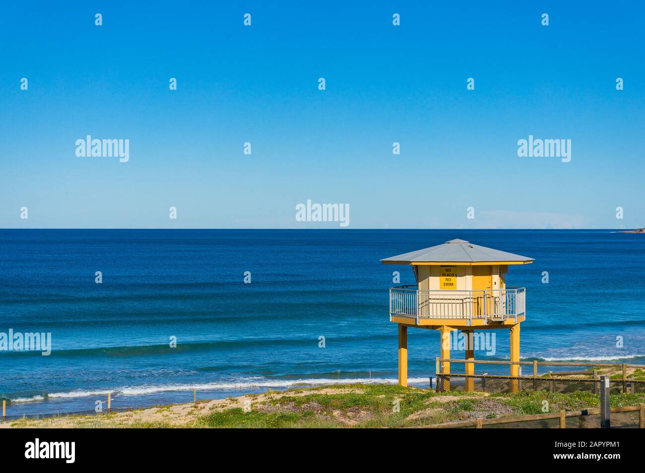 Rescue tower on the beach with blue ocean view on sunny day Stock Photo ...