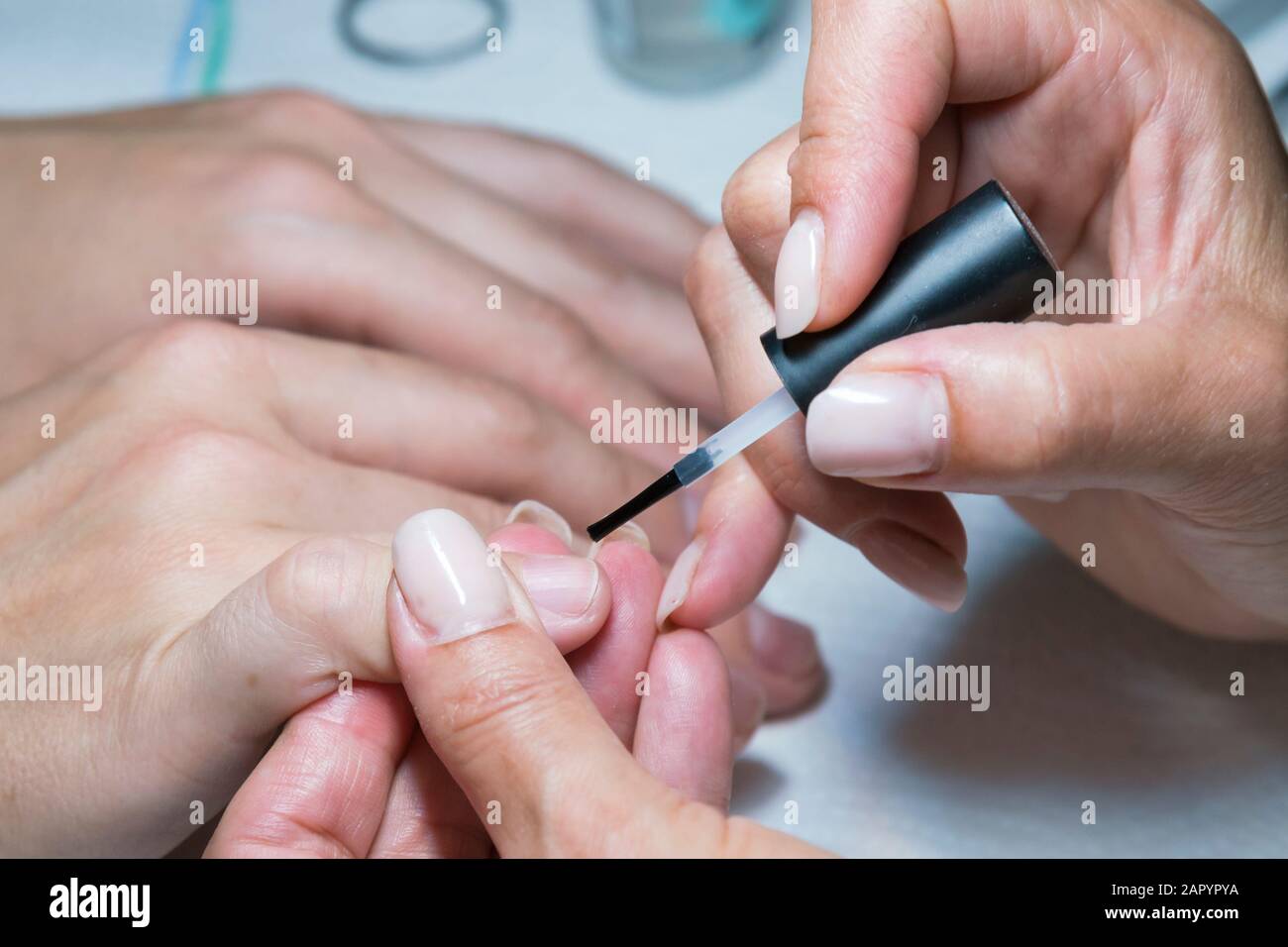 Applying nail paint hi-res stock photography and images - Page 11 - Alamy